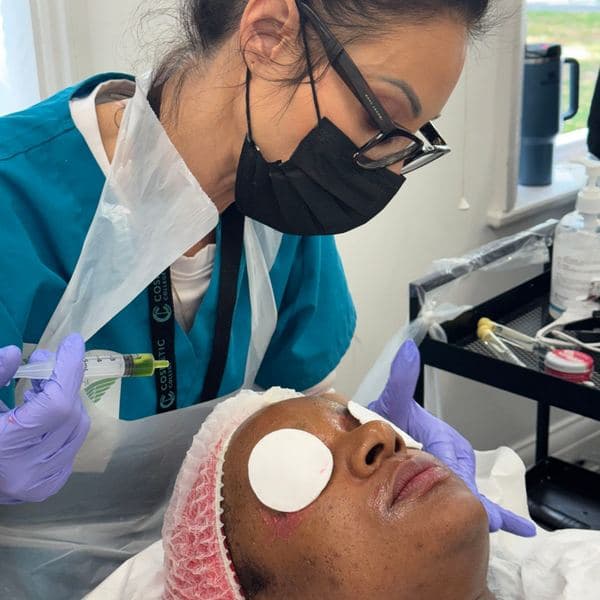 Practical skin treatment training on a real model